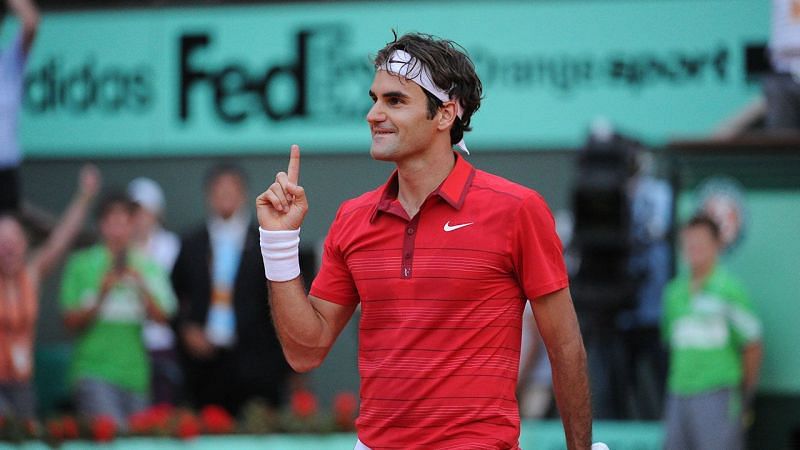 Federer exults after ending Djokovic's stunning 41-0 start to the year, at the 2011 French Open semis